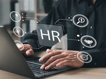 HR professional working on a laptop